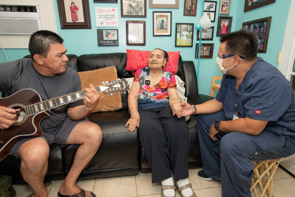 Patient Esperaza Borboa with her son Johnny and Hospice of the Valley nurse, Giancarlo Fratiglioni.